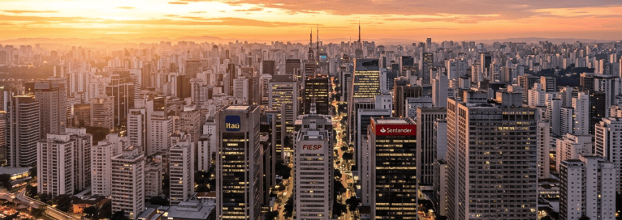 São Paulo city skyline with high-rise buildings and busy roads at sunset
